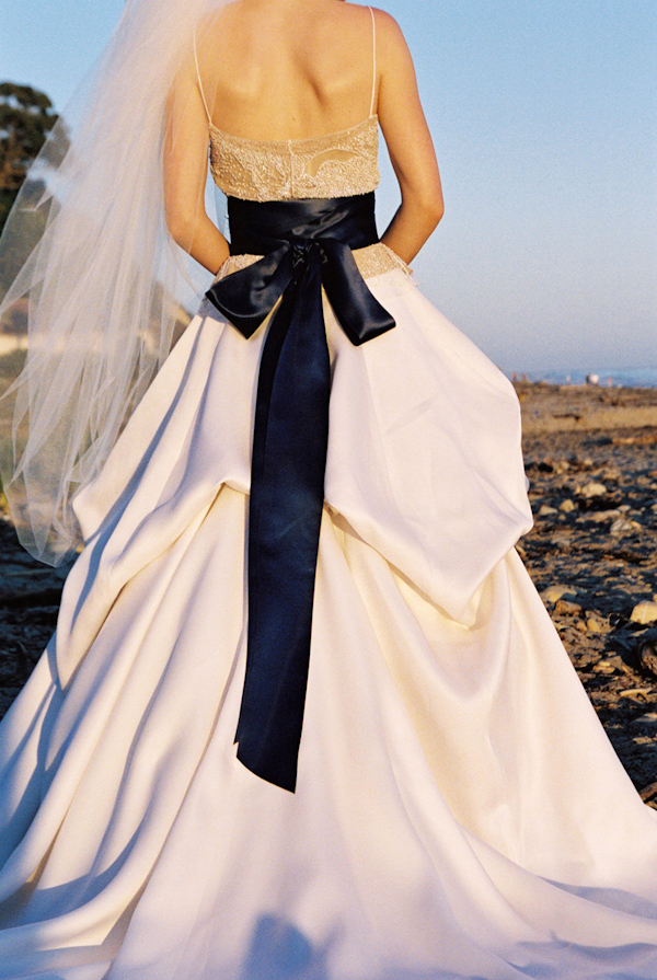 wedding dress and black sash photo by Yvette Roman Photography